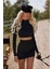Kadın Siyah Uzun Kollu Crop Top ve Mini Etek Takım - Şık ve Modern Iki Parça Kombin 1
