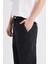 %100 Pamuk Relaxed Slouchy Fit Rahat Beli Lastikli Rahat Kesim Dar Paça Siyah Jean Pantolon B8320AX25SP 6