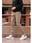 Bel ve paça lastikli, gabardin kumaş, taş jogger pantolon 1