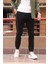 Bel ve paça lastikli, gabardin kumaş, siyah jogger pantolon 1