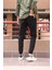 Bel ve paça lastikli, gabardin kumaş, siyah jogger pantolon 2