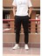 Bel ve paça lastikli, gabardin kumaş, siyah jogger pantolon 3