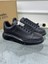 Oversize Siyah Deri Sneaker – Alexander McQueen’in İkonik Şıklığıyla Cesur Adımlar 1