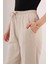 Cepli Belden Bağlamalı Paça Detaylı Krem Pantolon 3