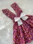 Kız Çocuk Bordo Çiçekli Fiyonklu Fırfır Askılı Salopet Elbise (%100 Pamuk Kumaştan Üretilmiştir.) 3