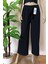 Kadın Siyah Beli Lastikli Dökümlü Geniş Paça Burgu Kumaş Palazzo Pantolon 3