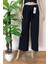 Kadın Siyah Beli Lastikli Dökümlü Geniş Paça Burgu Kumaş Palazzo Pantolon 5