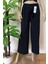Kadın Siyah Beli Lastikli Dökümlü Geniş Paça Burgu Kumaş Palazzo Pantolon 6