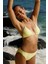 Kadın Orta Bel Ruth Slip Bikini Altı – Sarı Dokulu Desensiz Kumaş, Deniz ve Yaz Tatili İçin Rahat Tasarım 8