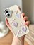 IPHONE 16 3D Kalp ve Fiyonk Dekorlu Ekru Renk Kılıf 1