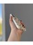IPHONE 15 Promax Krem Renk Dalgalı Siyah Kalp Desenli Kılıf 3