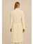 Krem Düğme Detaylı Kuşaklı Uzun Kaban 3