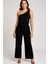 Kadın Siyah Tek Omuzlu Şık Bluz & Geniş Paça Pantolon Ikili Takım – Modern, Konforlu ve Günlük Kombinlere Uygun 1