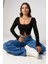 Kadın Siyah Uzun Kollu Agraflı Göğüs ve Göbek Dekolteli Crop Top Bluz – Şık, Rahat ve Kolay Kombinlenebilir 1