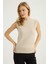 Kolsuz Kıvrık Yaka Triko 1