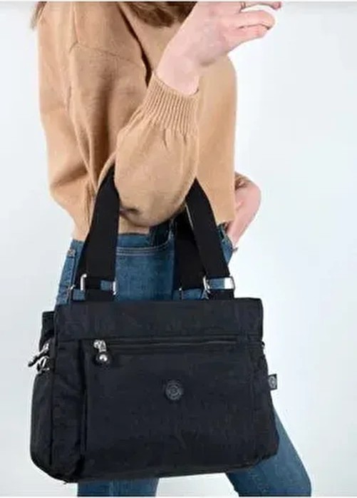 Mega Çanta Kipling Siyah Suni Deri Kol ve Çapraz Çanta Business Koleksiyonu ile Şık ve Düz Tasarım