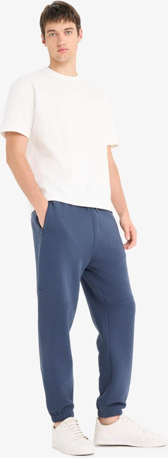 DeFacto Regular Fit Beli Bağcıklı İçi Yumuşak Tüylü Paçası Lastikli Baskılı Fermuar Cepli Eşofman Altı Y5511AZ25AU