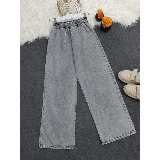 White Lily Boutique Bol Paça Beli Lastikli Bağcık Detaylı Kot Pantolon