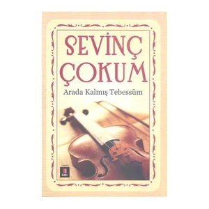 Arada Kalmış Tebessüm - Sevinç Çokum